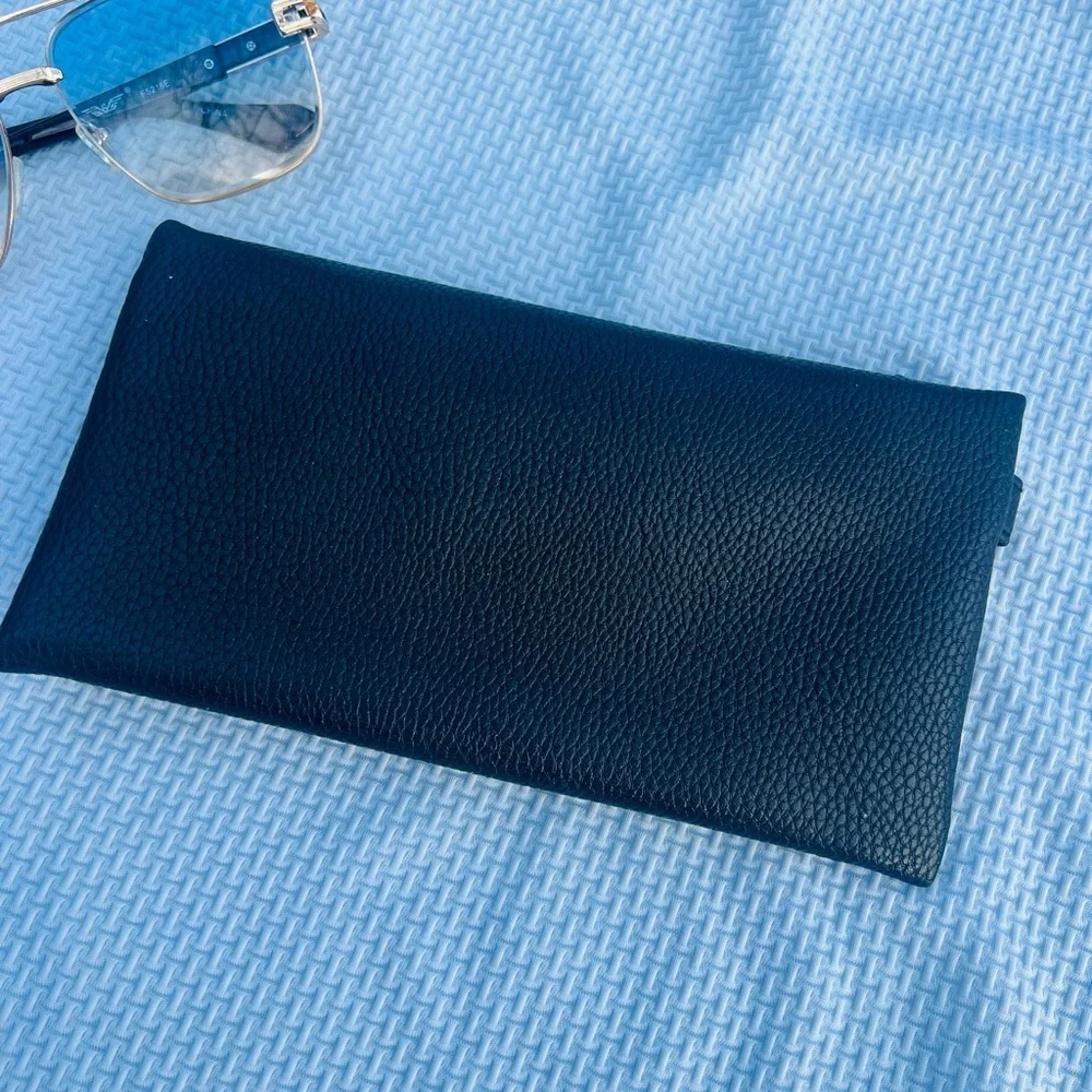 Tumi Black and Blue Toiletry Bag